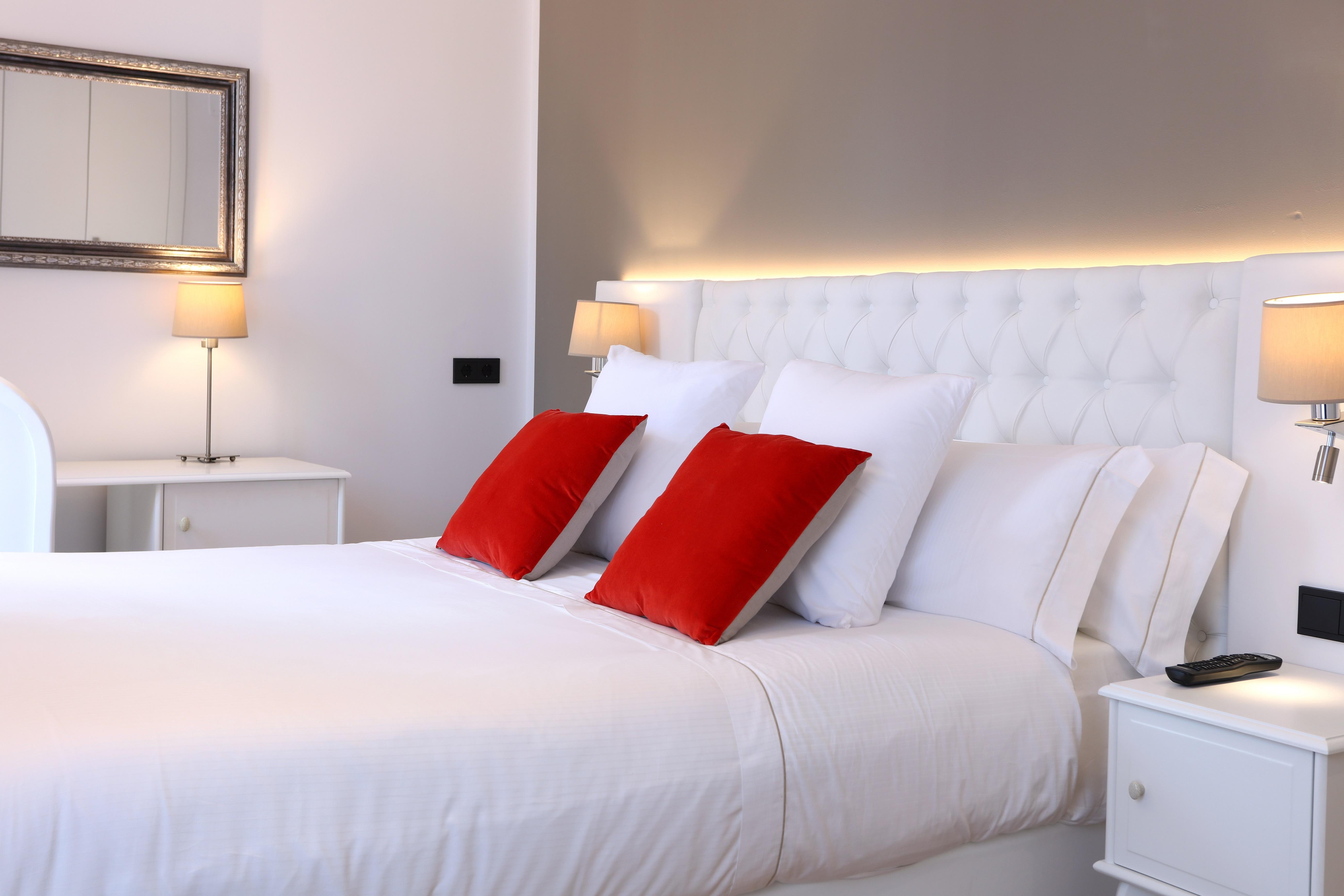 Bo Hotel Palma Exterior photo A bedroom in a luxury hotel in Italy.